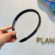 HEAD BAND IN BLACK LAMBSKIN AND RESIN 417299