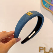 THICK HEADBAND IN AZURE BLUE DENIM GOLD LOGO 425464