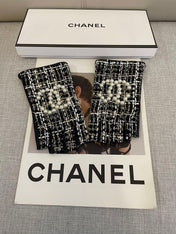 FINGERLESS GLOVES IN BLACK MIX WHITE WOOL TWEED 463847