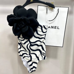 ONE-PIECE SWIMSUIT WITH FLORAL PATTERN IN BLACK AND WHITE 627827