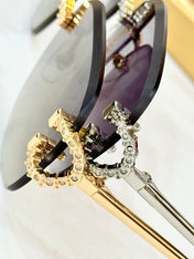 CRYSTAL STUDDED RIMLESS SQUARE FRAME SUNGLASSES CT0604S IN METAL