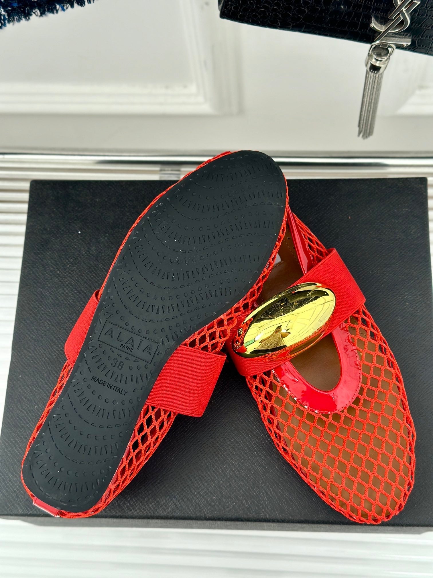 ALAIA MARY JANE SHOES IN CHERRY RED MESH WITH GOLD HARDWARE