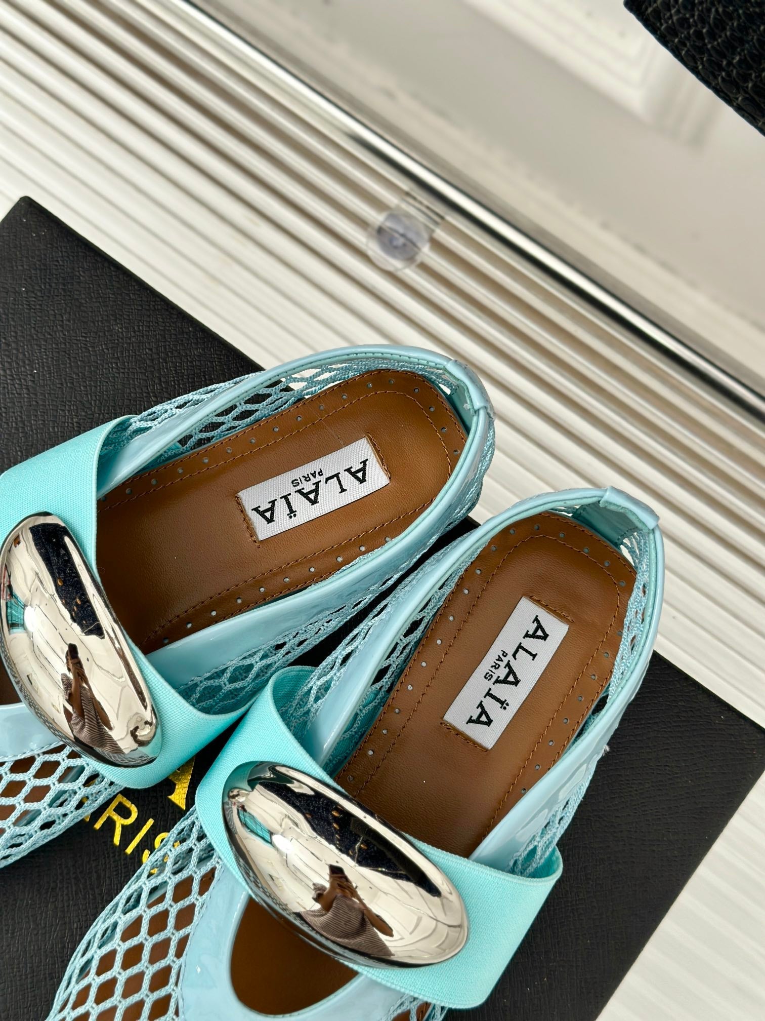 ALAIA MARY JANE SHOES IN SKY BLUE MESH WITH SILVER HARDWARE