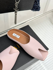 ALAIA FLAT MULE IN LIGHT PINK LAMBSKIN