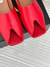 ALAIA FLAT MULE IN CRIMSON RED LAMBSKIN