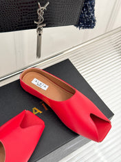 ALAIA FLAT MULE IN CRIMSON RED LAMBSKIN