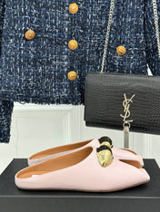 ALAIA FLAT MULE IN LIGHT PINK LAMBSKIN WITH GOLD HARDWARE