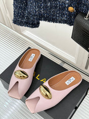 ALAIA FLAT MULE IN LIGHT PINK LAMBSKIN WITH GOLD HARDWARE