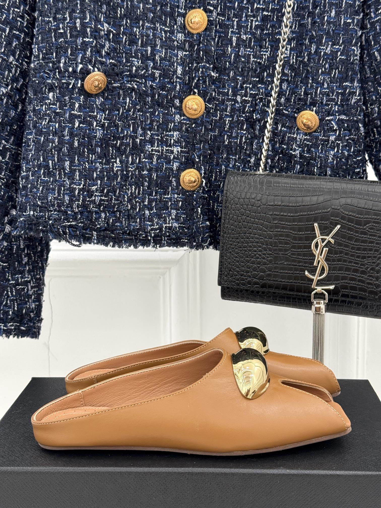 ALAIA FLAT MULE IN BRONZE BROWN LAMBSKIN WITH GOLD HARDWARE