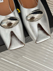 ALAIA FLAT MULE IN SILVER LAMBSKIN WITH SILVER HARDWARE