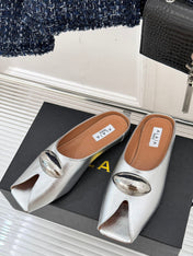 ALAIA FLAT MULE IN SILVER LAMBSKIN WITH SILVER HARDWARE