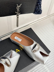 ALAIA FLAT MULE IN SILVER LAMBSKIN WITH SILVER HARDWARE