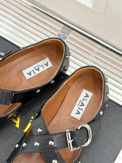 CROSSED STRAP BALLET FLATS IN BLACK CALFSKIN