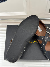 CROSSED STRAP BALLET FLATS IN BLACK CALFSKIN