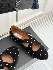 CROSSED STRAP BALLET FLATS IN BLACK SUEDE