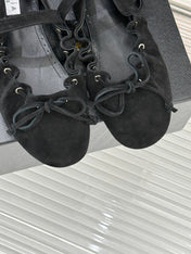 ALAIA 26S MARY JANE FLATS IN BLACK SUEDE WITH BOW