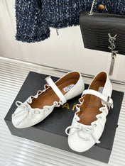 ALAIA 26S MARY JANE FLATS IN WHITE LAMBSKIN WITH BOW