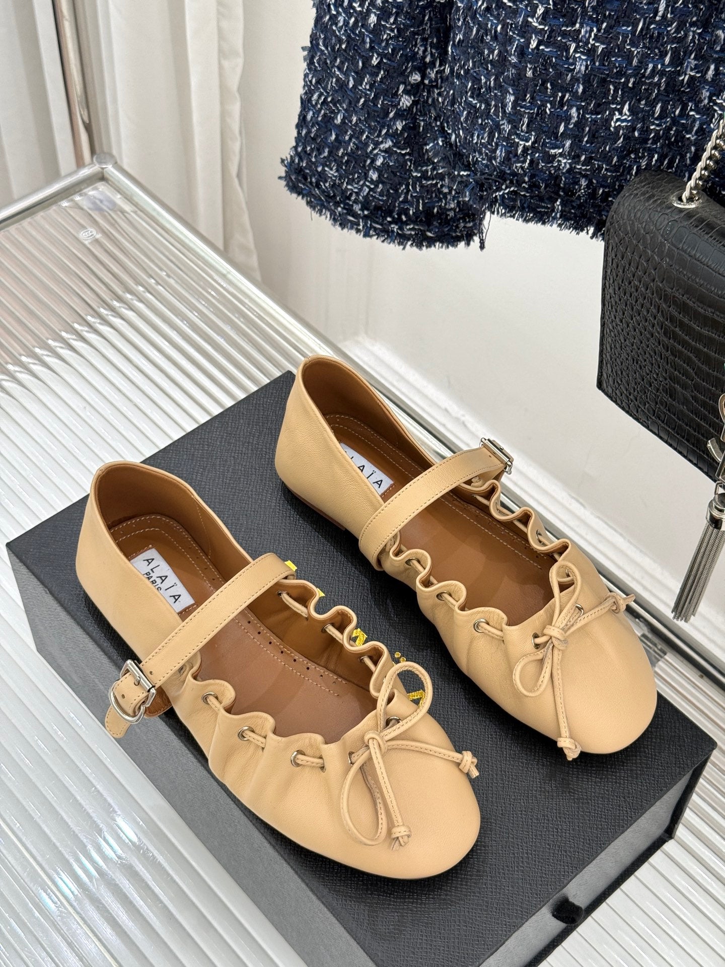 ALAIA 26S MARY JANE FLATS IN LIGHT YELLOW BEIGE LAMBSKIN WITH BOW