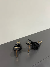 BLACK GEM-STUDDED SLINGBACK PUMPS IN BLACK PATENT CALFSKIN