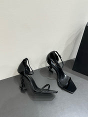 YSL HEELED SANDALS 25S 105 MM IN BLACK GLOSSY LAMBSKIN