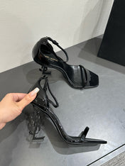 YSL HEELED SANDALS 25S 105 MM IN BLACK GLOSSY LAMBSKIN
