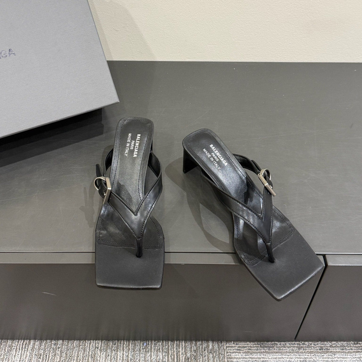 BALENCIAGA 25S HIGH-HEELED FLIP-FLOPS IN BLACK CALFSKIN WITH SILVER HARDWARE