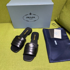 PRADA 25S SLIDES IN BLACK CALFSKIN