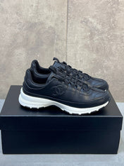 CHANEL 26S RUNNER CC LOGO SNEAKERS IN BLACK CALFSKIN