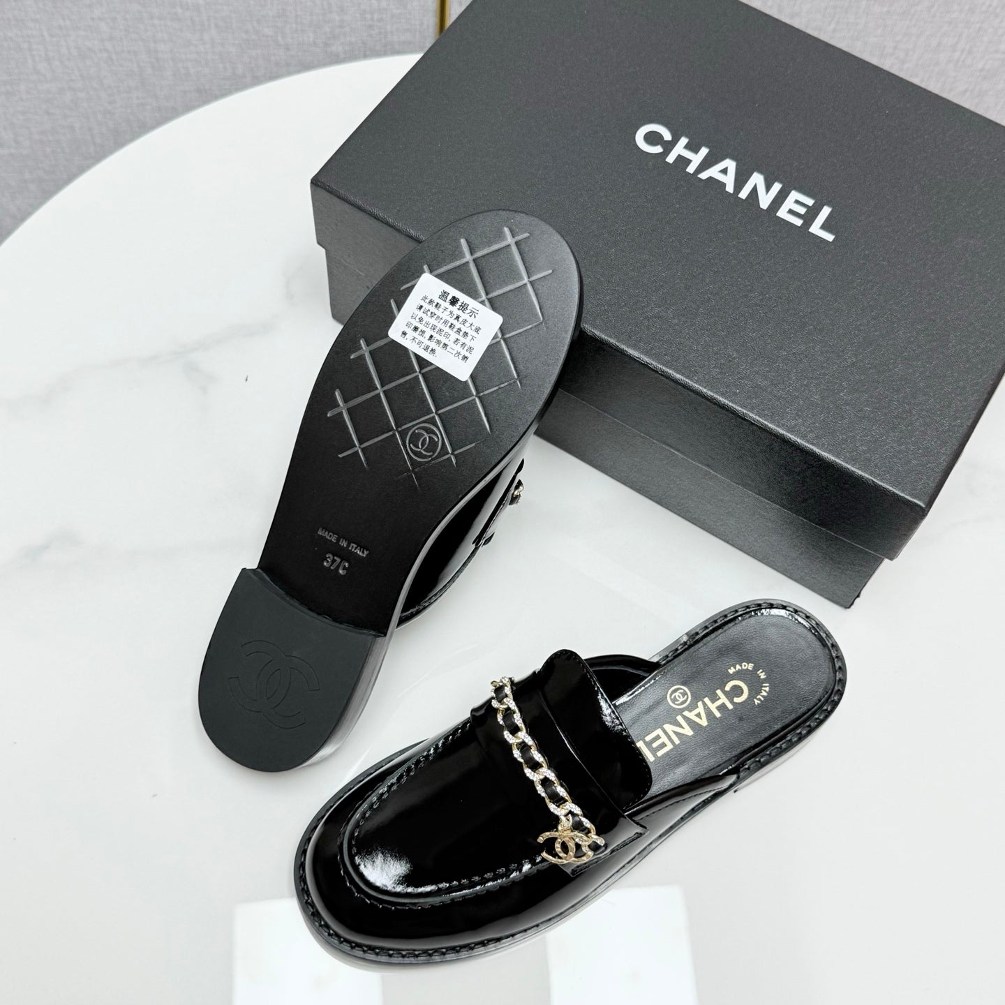 CC FLAT MULE 25S IN BLACK CALFSKIN STYLE 4
