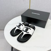CHANEL 26S CC THONG SLIDES IN WHITE AND BLACK LAMBSKIN