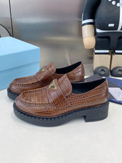 PRADA 26S LOAFERS IN DARK BROWN CROCODILE PRINT CALFSKIN