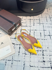ALAIA FLAT SLINGBACK IN YELLOW PATENT CALFSKIN AND FILM