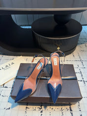 ALAIA HIGH SLINGBACK 25S 90 MM IN NAVY BLUE CALFSKIN