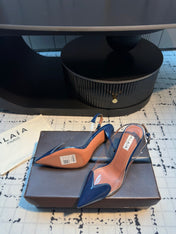 ALAIA HIGH SLINGBACK 25S 90 MM IN NAVY BLUE CALFSKIN