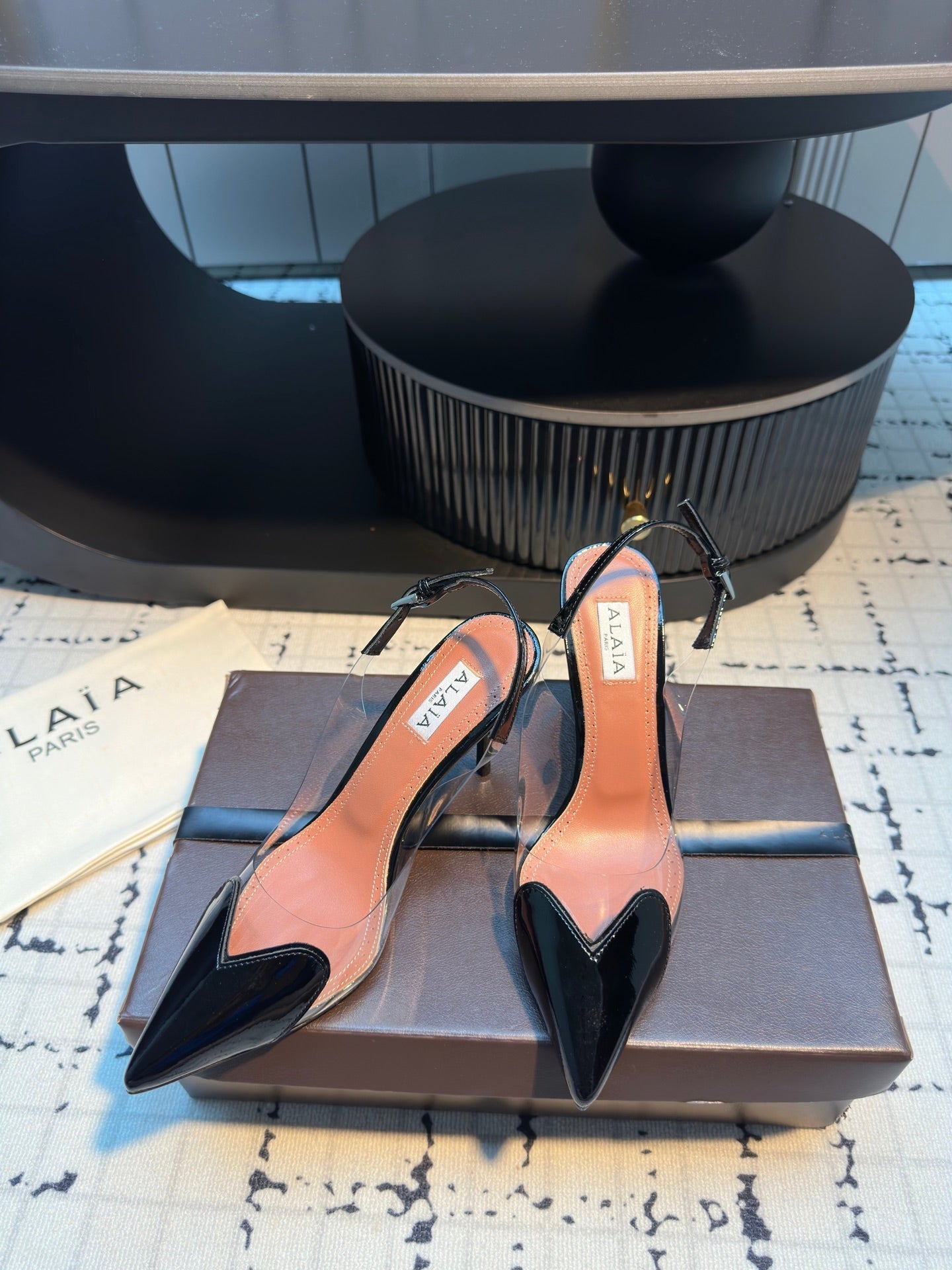 ALAIA HIGH SLINGBACK 25S 90 MM IN BLACK CALFSKIN