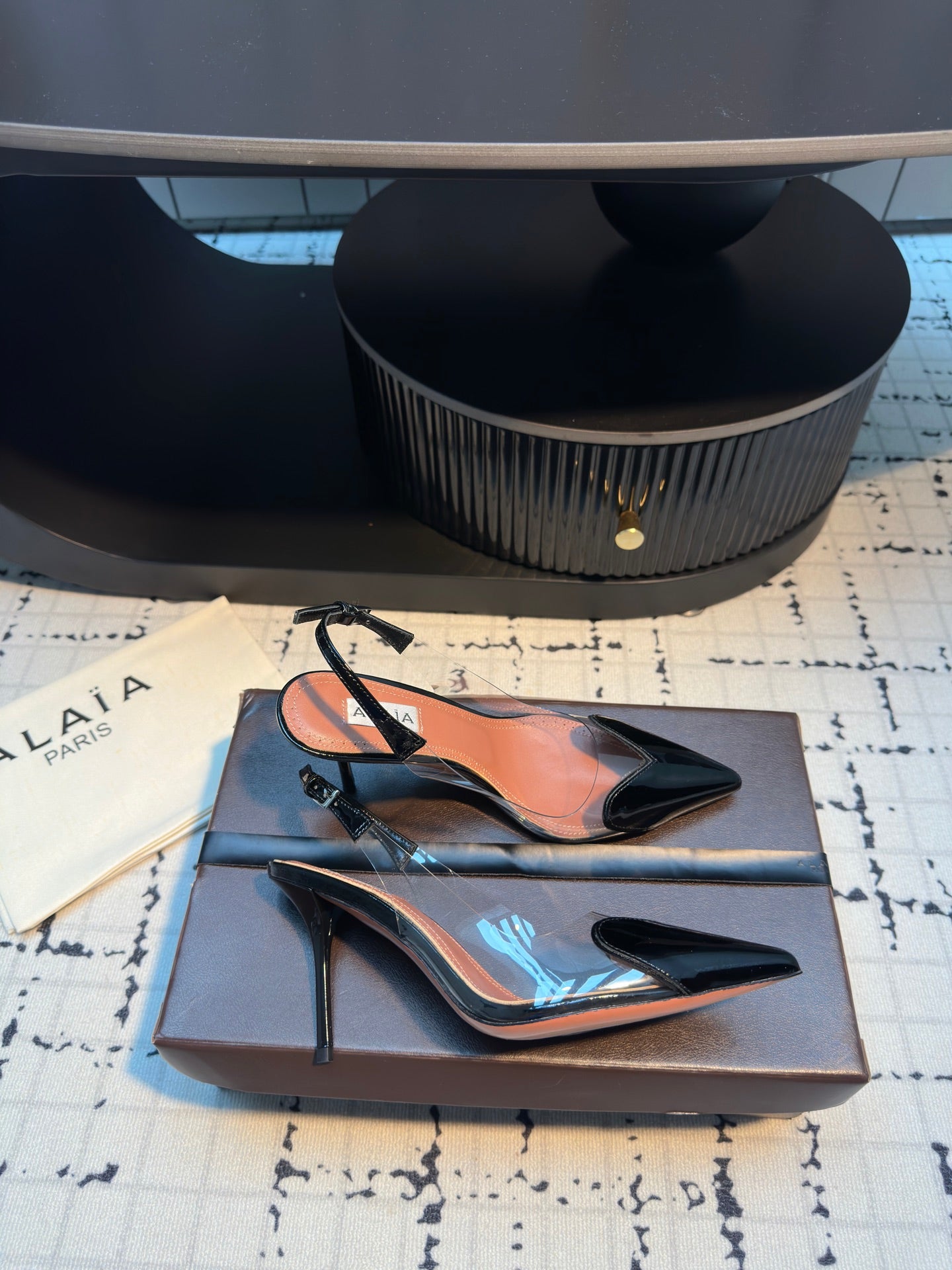ALAIA HIGH SLINGBACK 25S 90 MM IN BLACK CALFSKIN