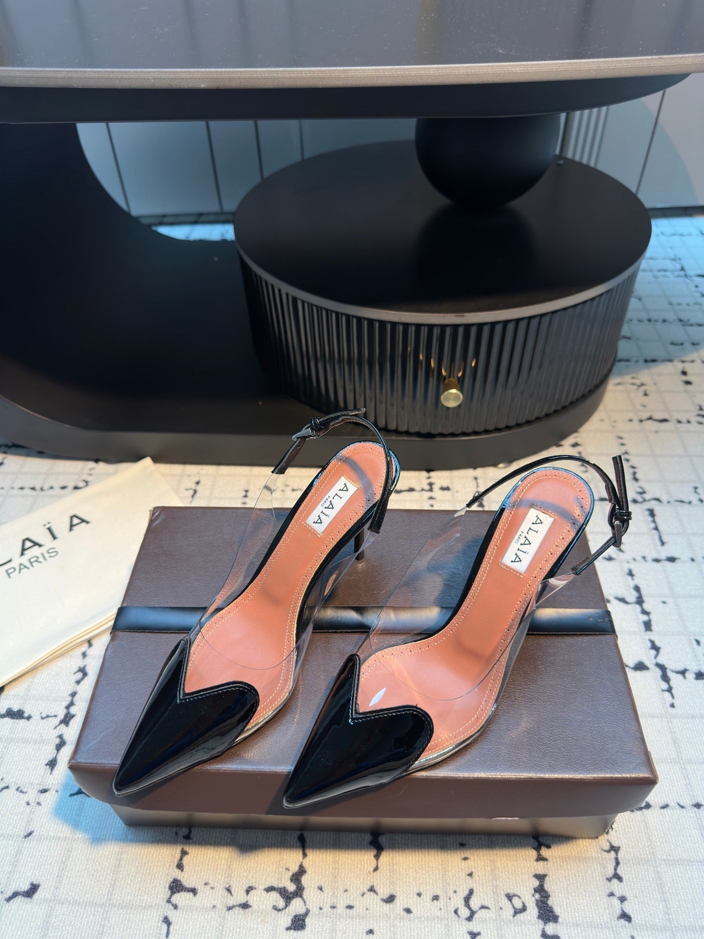 ALAIA HIGH SLINGBACK 25S 90 MM IN BLACK CALFSKIN