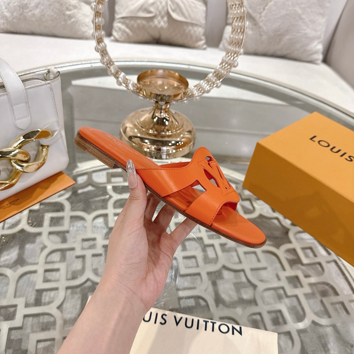 ISOLA FLAT SLIDE IN VIVID ORANGE CALFSKIN