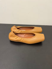 ALAIA BALLET FLATS IN COPPER BROWN SMOOTH CALFSKIN