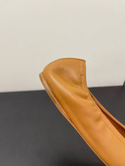 ALAIA BALLET FLATS IN COPPER BROWN SMOOTH CALFSKIN