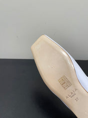 ALAIA BALLET FLATS IN WHITE SMOOTH CALFSKIN