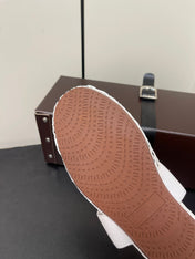 ALAIA BALLET FLATS IN WHITE MESH FISHNET WITH GOLD HARDWARE