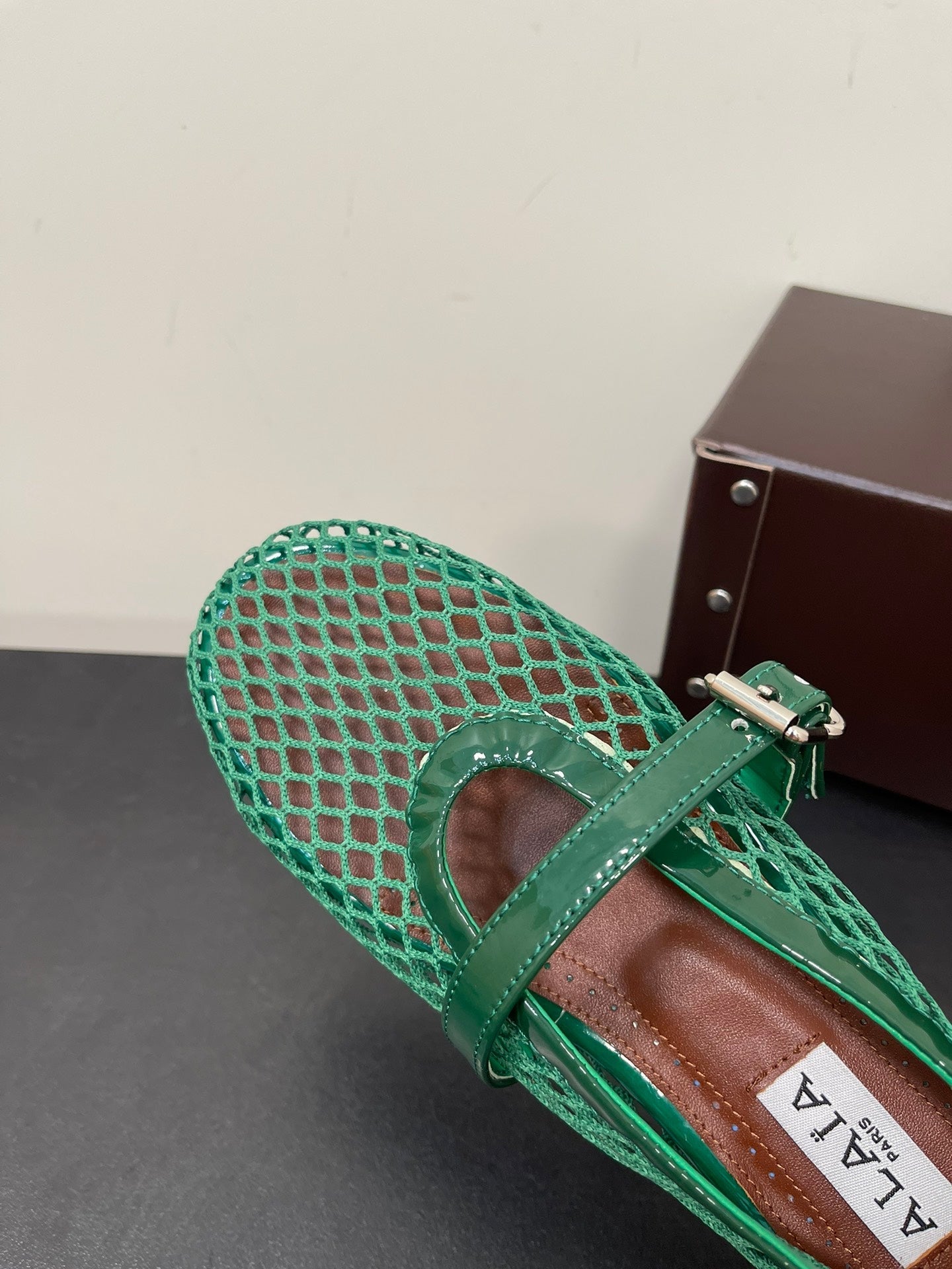 ALAIA BALLET FLATS IN COOL GREEN MESH FISHNET