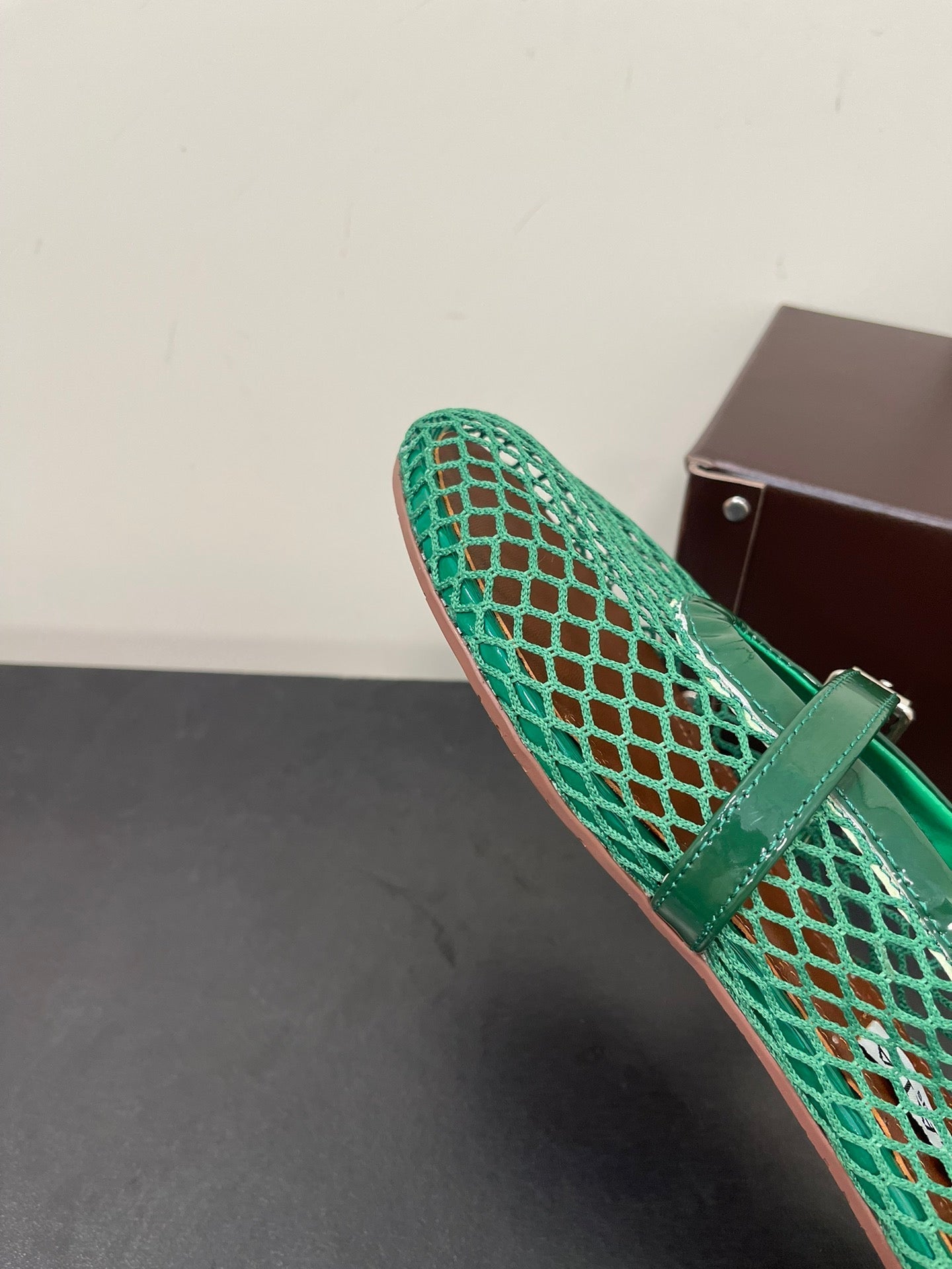 ALAIA BALLET FLATS IN COOL GREEN MESH FISHNET