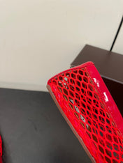 ALAIA BALLET FLATS IN CHERRY RED MESH FISHNET