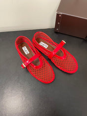 ALAIA BALLET FLATS IN CHERRY RED MESH FISHNET
