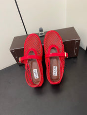 ALAIA BALLET FLATS IN CHERRY RED MESH FISHNET