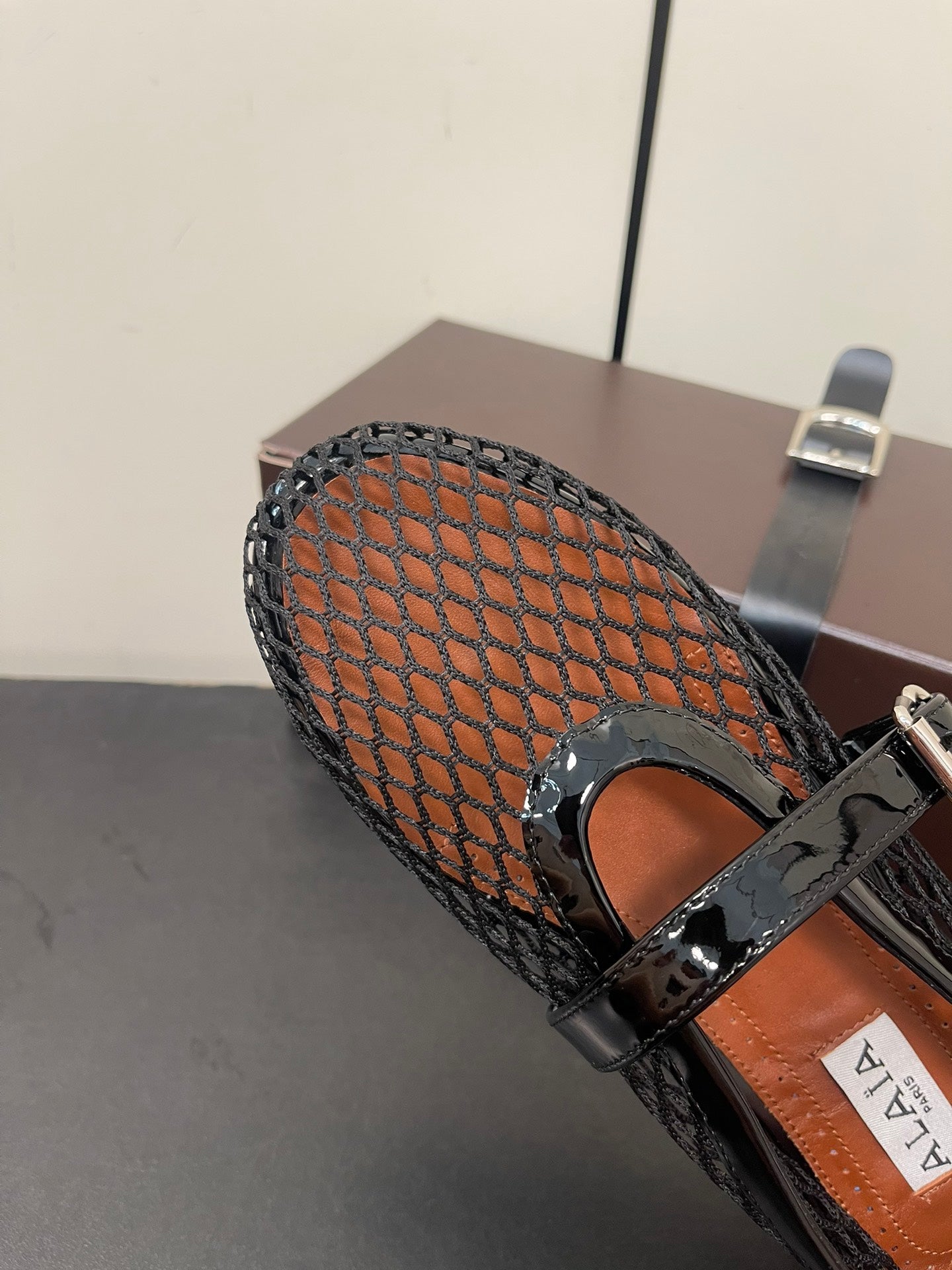 ALAIA BALLET FLATS IN BLACK MESH FISHNET