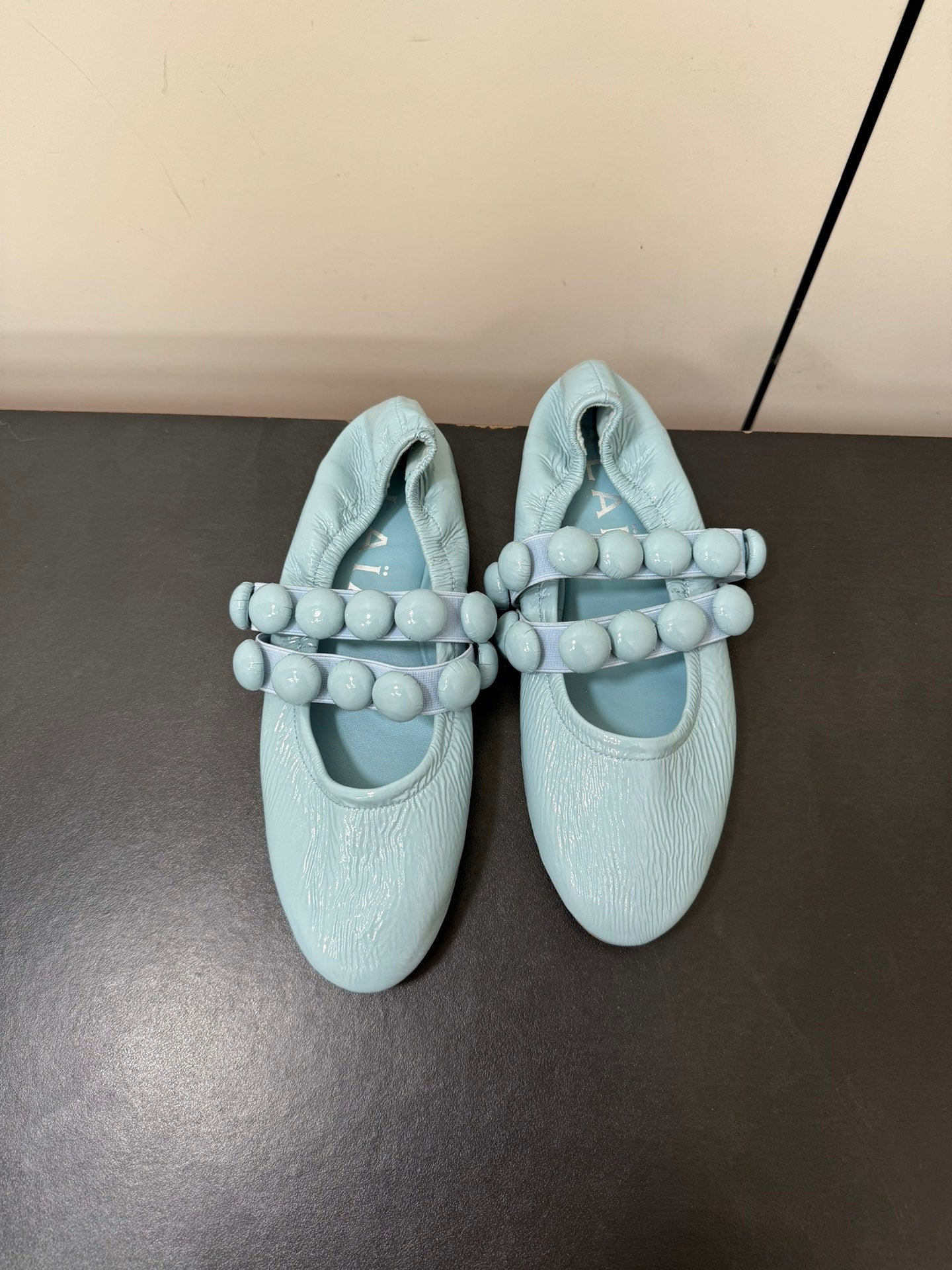 ALAIA SPHERE BALLET FLATS IN LIGHT BLUE LAMBSKIN