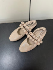 ALAIA SPHERE BALLET FLATS IN ALMOND BEIGE LAMBSKIN